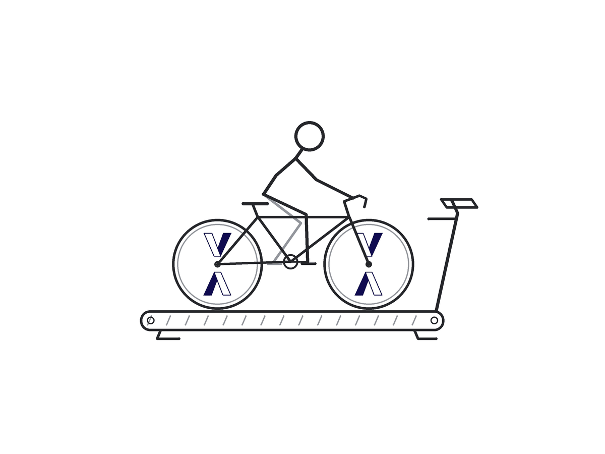 Looping animation of a cyclist pedalling a stationary bike, with the wheels formed from two mirrored Vocalise logomarks